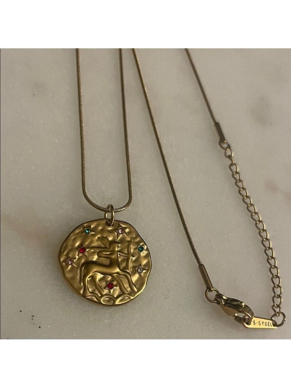 Taurus Zodiac Pendant on a Stamped Stainless Steel Gold Necklace